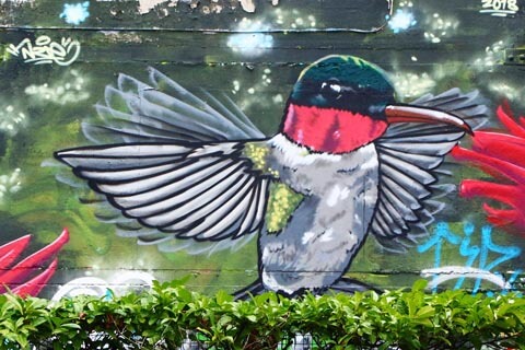 Street art by NZIE at Wimbledon Park, Southsea